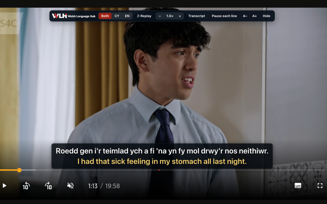 The real Clic Companion toolbar on S4C Clic, showing Both, CY and EN subtitle choices, replay, speed, transcript, pause each line and subtitle size controls, with bilingual subtitles below